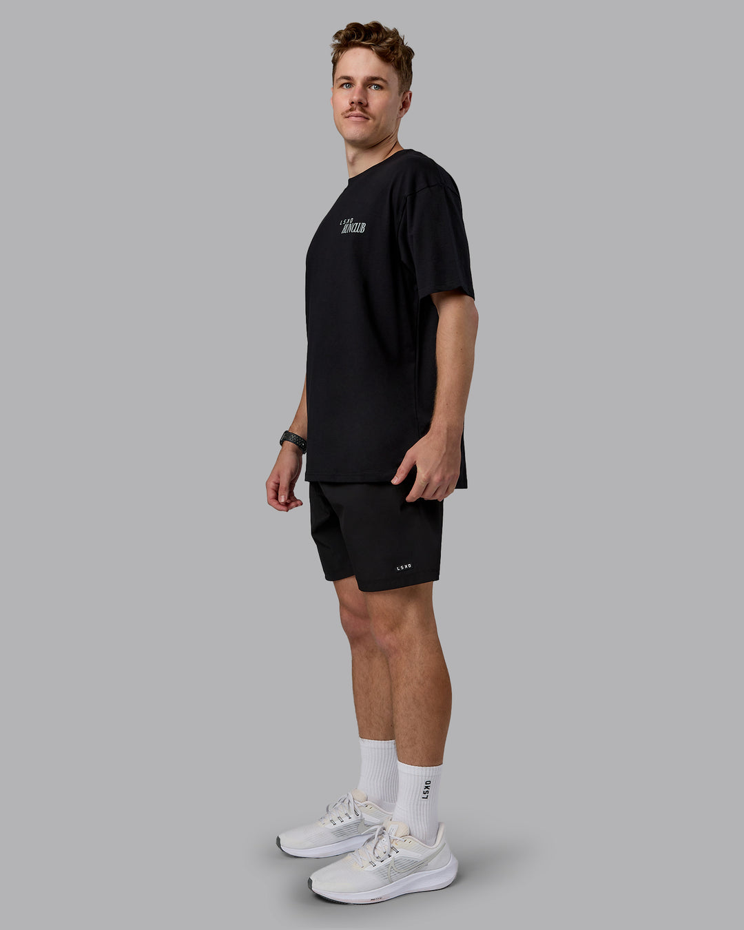 Man wearing Run Love FLXCotton Oversized Tee - Black-Reflective | Model:Cameron | Size:M - view 5