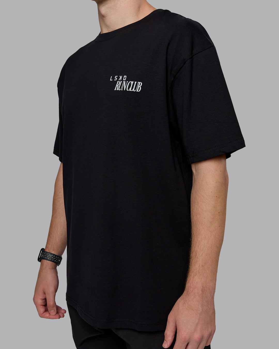 Man wearing Run Love FLXCotton Oversized Tee - Black-Reflective | Model:Cameron | Size:M - view 8