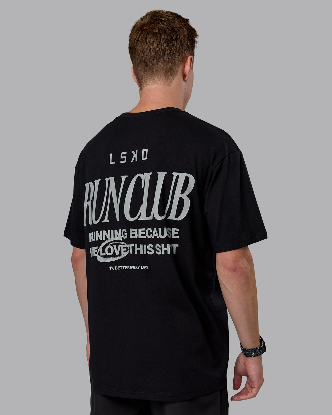 Man wearing Run Love FLXCotton Oversized Tee - Black-Reflective | Model:Cameron | Size:M - view 7