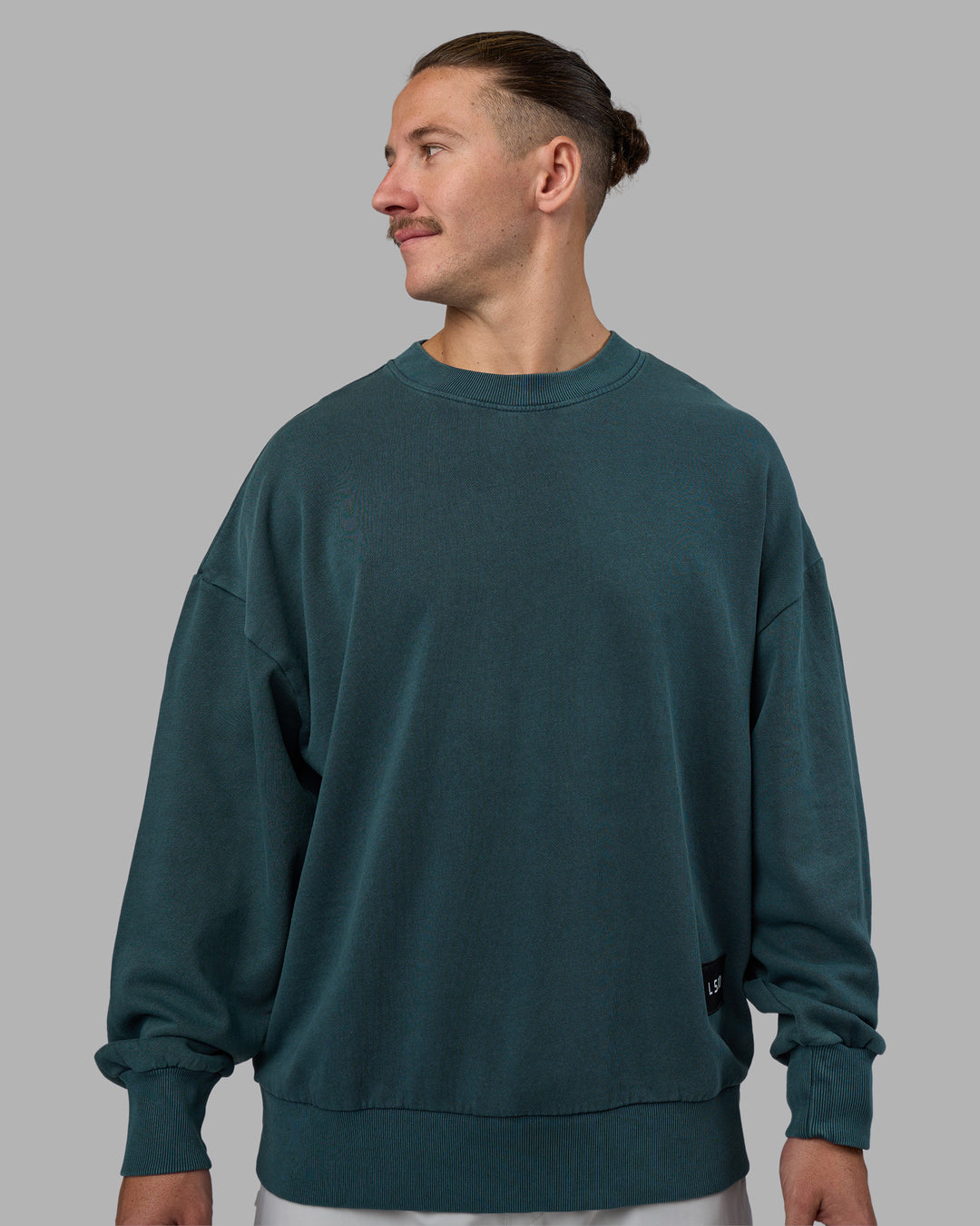 Man wearing Segmented Oversized Sweater - Abyssal | Model:Jaiden | Size:M - view 4