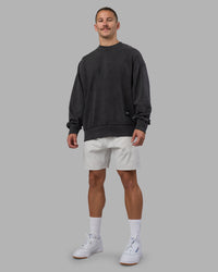 Man wearing Segmented Oversized Sweater - Black Washed | Model:Jaiden | Size:M | Thumbnail Index: 1