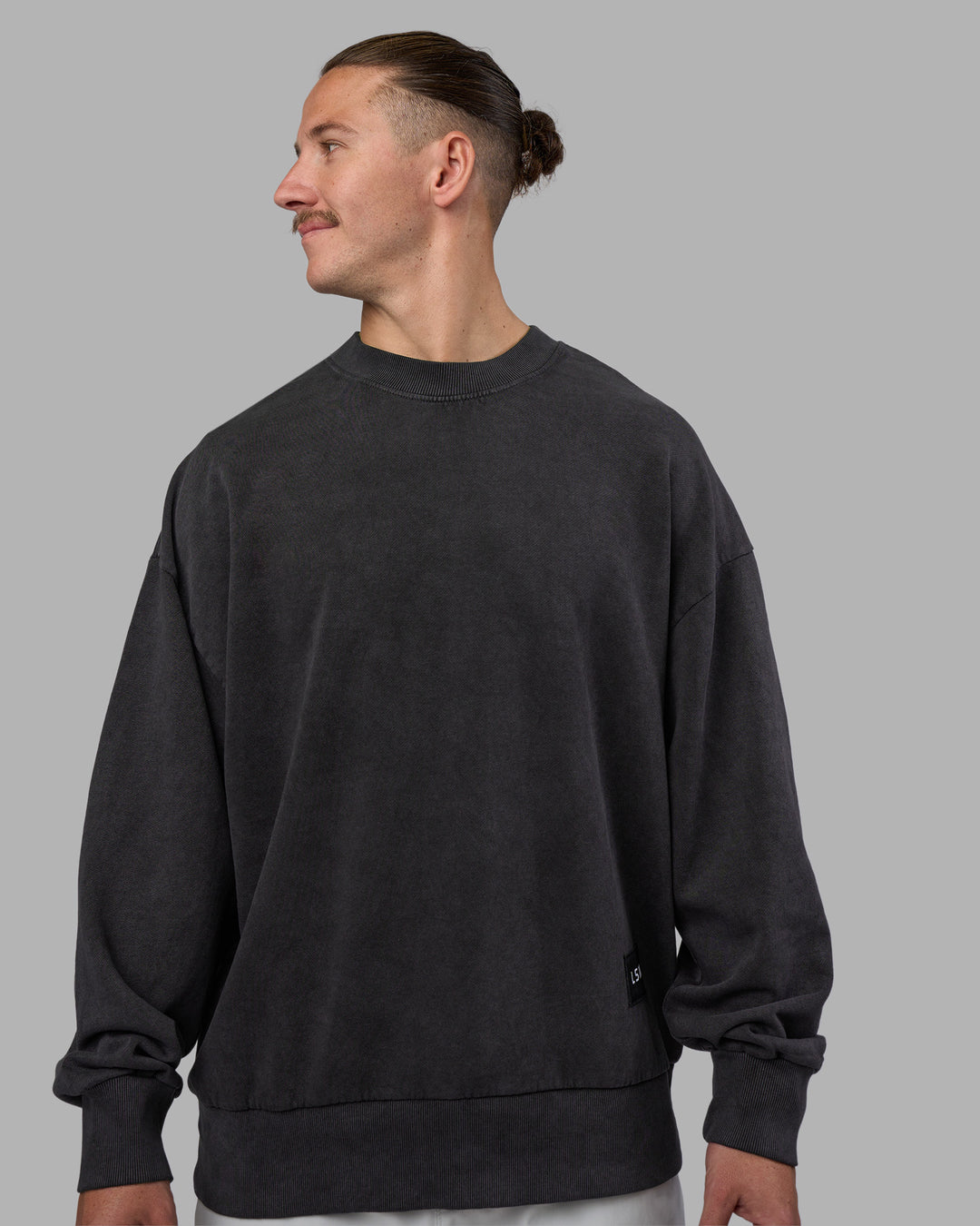 Man wearing Segmented Oversized Sweater - Black Washed | Model:Jaiden | Size:M - view 3