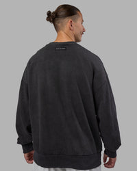 Man wearing Segmented Oversized Sweater - Black Washed | Model:Jaiden | Size:M | Thumbnail Index: 5