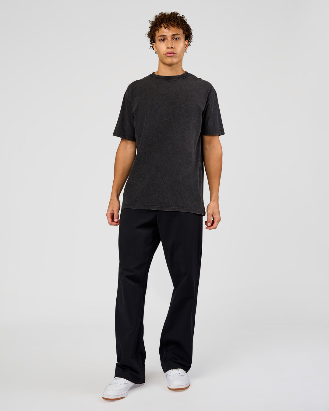 Man wearing Shadow Mode FLXCotton Oversized Tee - Black Washed | Model:Leandro | Size:M - view 10