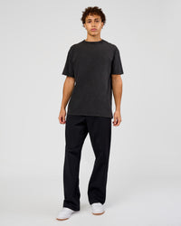 Man wearing Shadow Mode FLXCotton Oversized Tee - Black Washed | Model:Leandro | Size:M | Thumbnail Index: 9