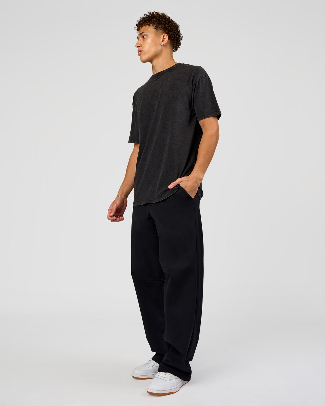 Man wearing Shadow Mode FLXCotton Oversized Tee - Black Washed | Model:Leandro | Size:M - view 6