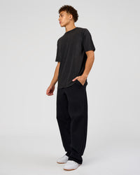 Man wearing Shadow Mode FLXCotton Oversized Tee - Black Washed | Model:Leandro | Size:M | Thumbnail Index: 5