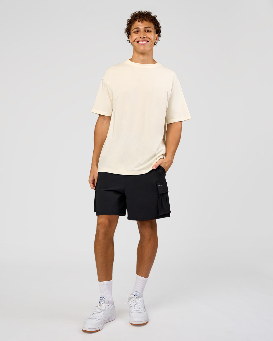Man wearing Shadow Mode FLXCotton Oversized Tee - Off White Washed | Model:Leandro | Size:M - view 7