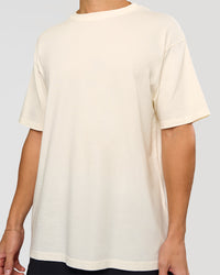 Man wearing Shadow Mode FLXCotton Oversized Tee - Off White Washed | Model:Leandro | Size:M | Thumbnail Index: 7