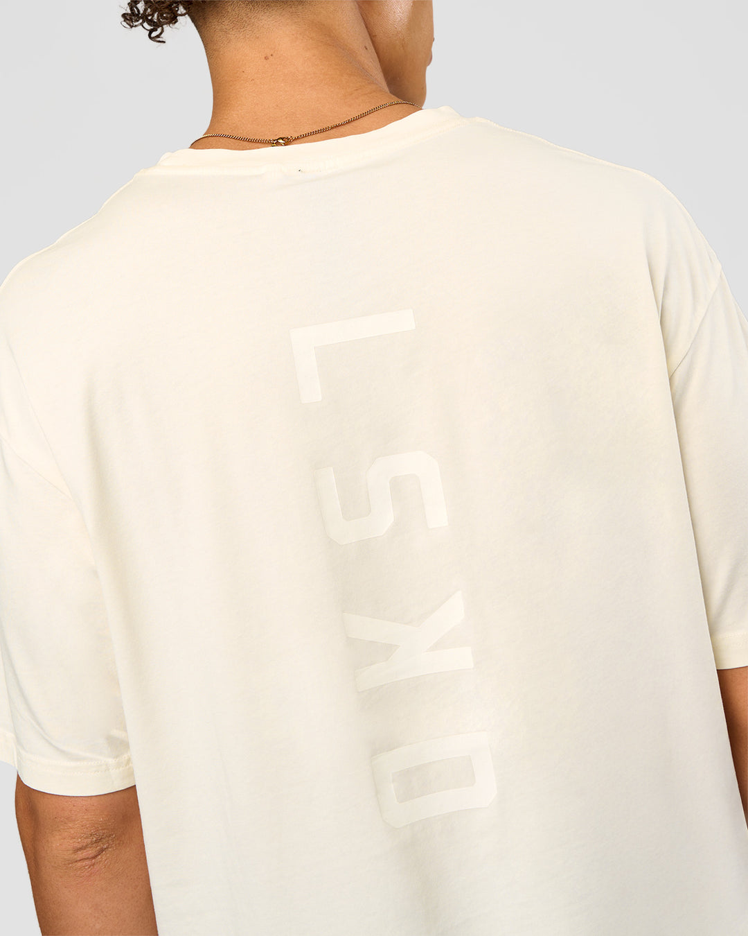 Man wearing Shadow Mode FLXCotton Oversized Tee - Off White Washed | Model:Leandro | Size:M - view 11