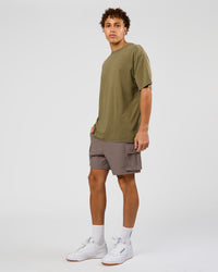 Man wearing Shadow Mode FLXCotton Oversized Tee - Walnut Grey Washed | Model:Leandro | Size:M | Thumbnail Index: 10
