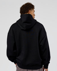 Man wearing Shadow Mode Oversized Hoodie - Black | Model:Leandro | Size:M | Thumbnail Index: 6