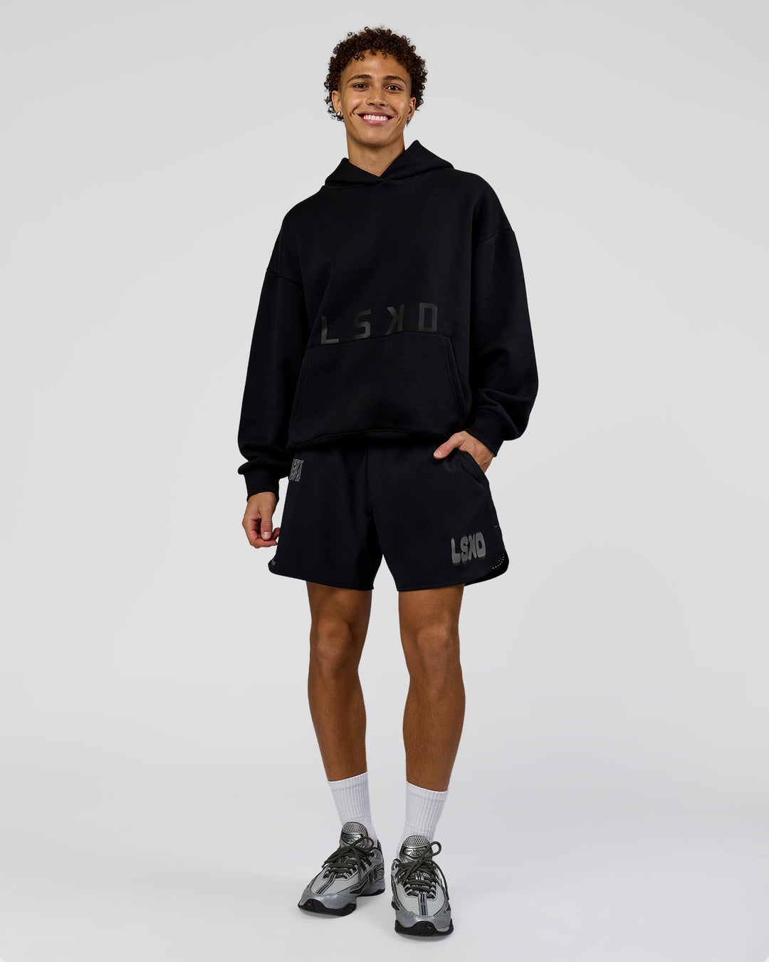 Man wearing Shadow Mode Oversized Hoodie - Black | Model:Leandro | Size:M - view 6