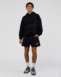 Man wearing Shadow Mode Oversized Hoodie - Black | Model:Leandro | Size:M | Thumbnail Index: 5
