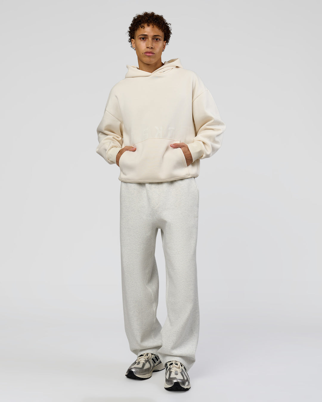 Man wearing Shadow Mode Oversized Hoodie - Off White | Model:Leandro | Size:M - view 12