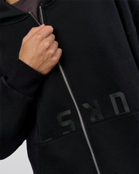 Man wearing Shadow Mode Oversized Zip Through Hoodie - Black | Model:Leandro | Size:M | Thumbnail Index: 8