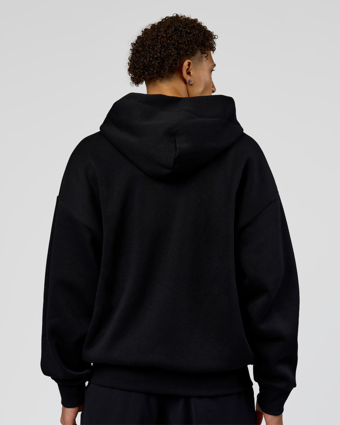 Man wearing Shadow Mode Oversized Zip Through Hoodie - Black | Model:Leandro | Size:M - view 8