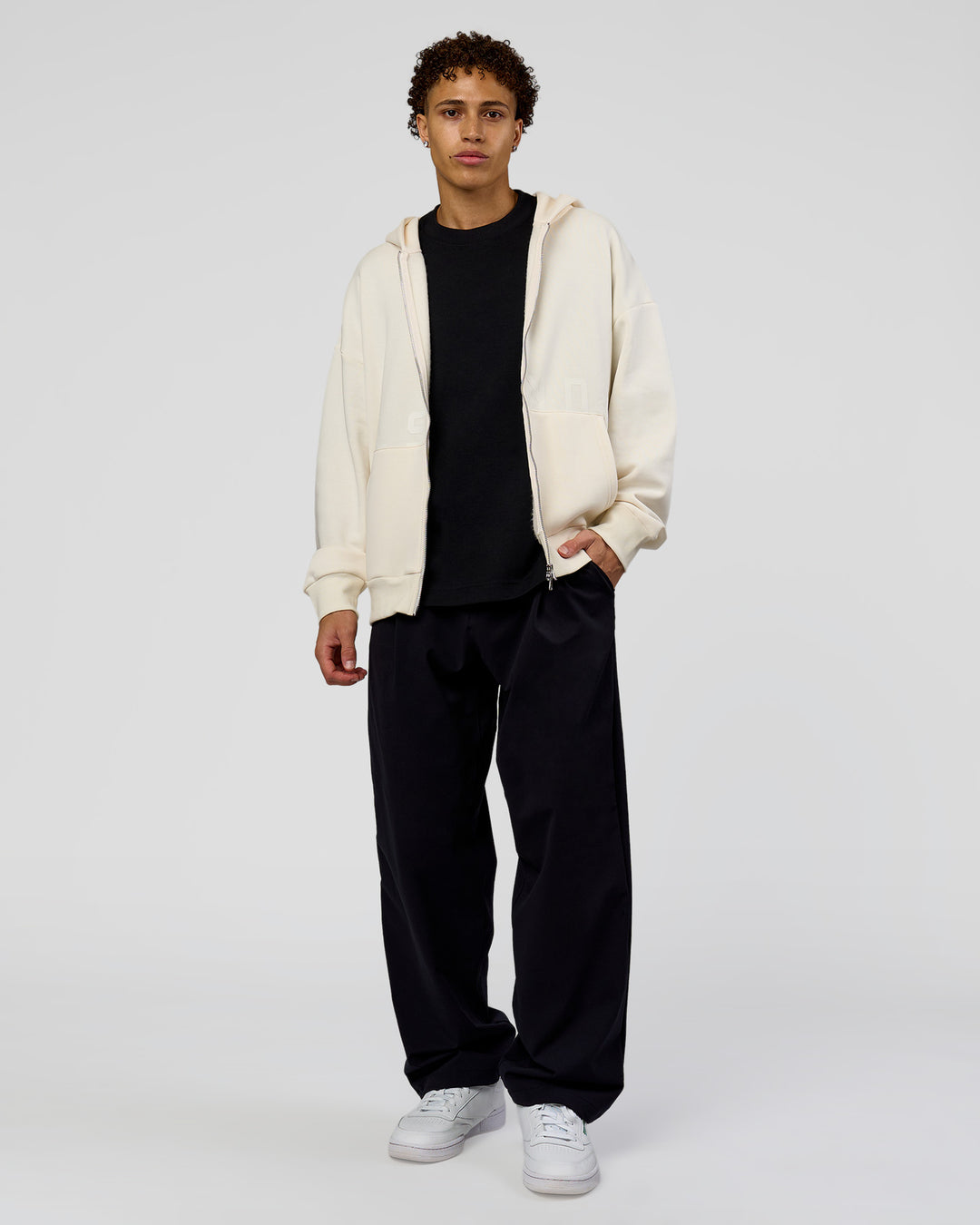 Man wearing Shadow Mode Oversized Zip Through Hoodie - Off White | Model:Leandro | Size:M - view 6