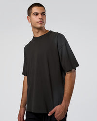 Man wearing Spray Heavyweight Unisex Oversized Tee - Charcoal Washed | Model:Zoran | Size:M | Thumbnail Index: 1