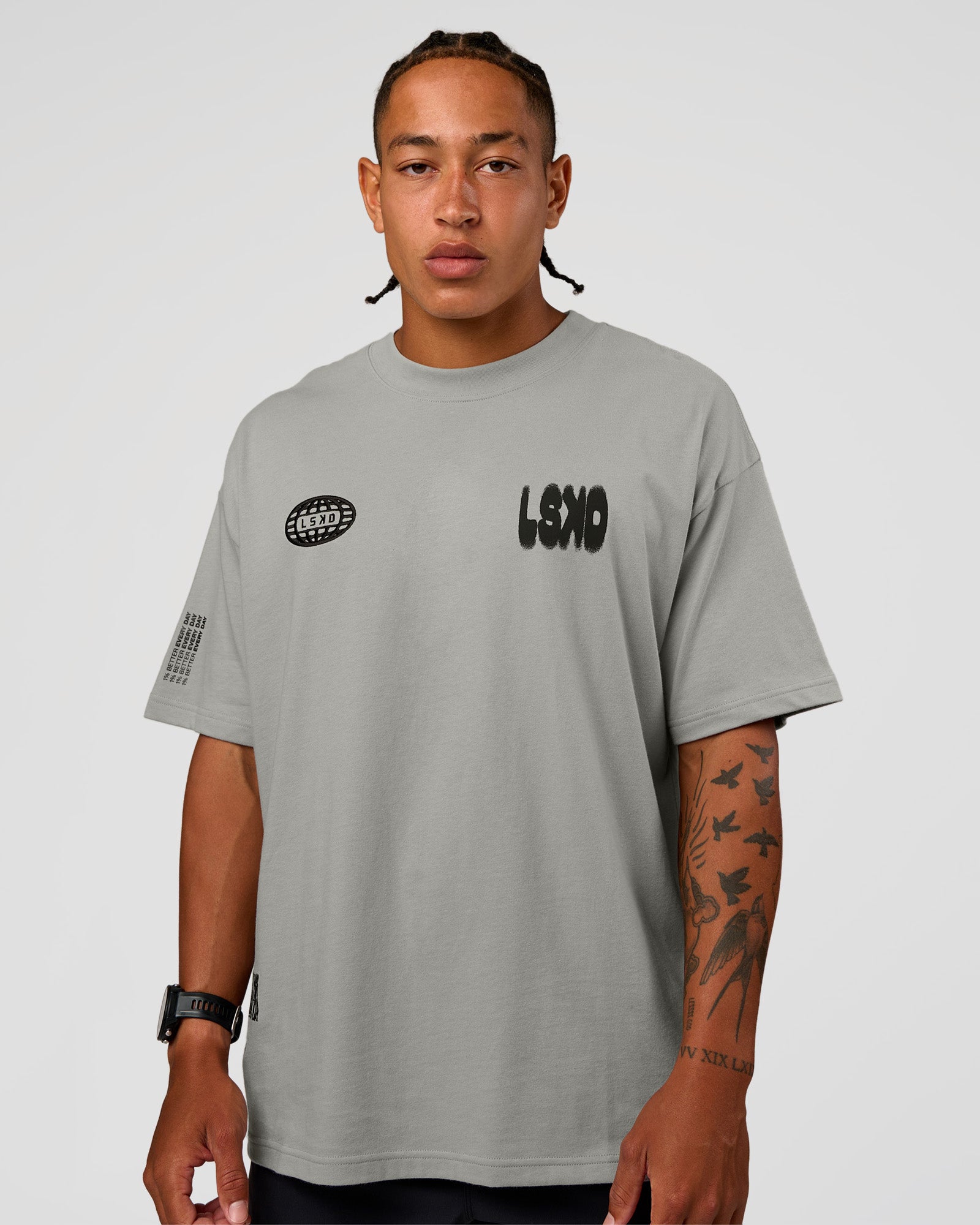 Man wearing Static Grit Heavyweight Oversized Tee - Alloy-Black | Model:Malebo | Size:M