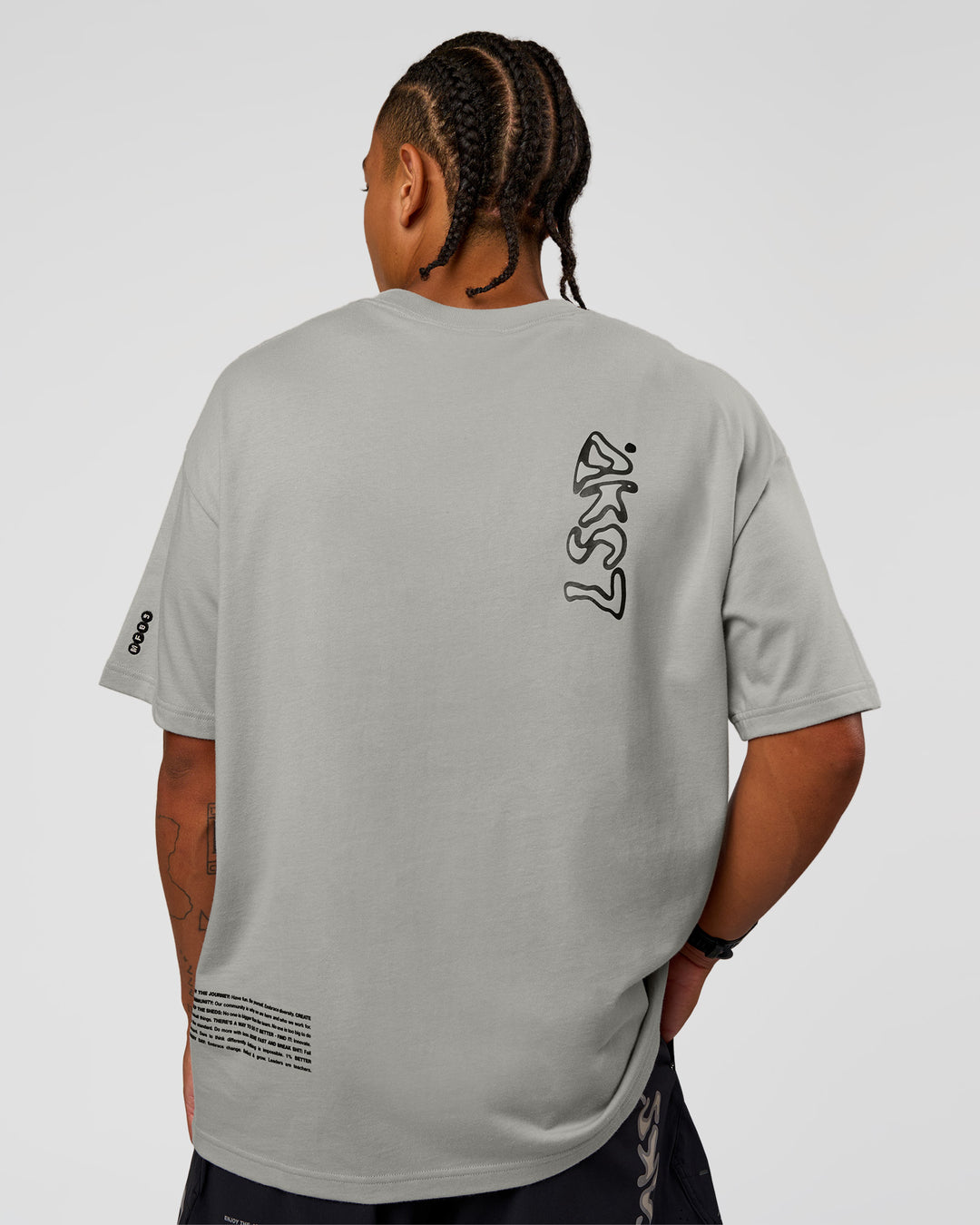 Man wearing Static Grit Heavyweight Oversized Tee - Alloy-Black | Model:Malebo | Size:M - view 10
