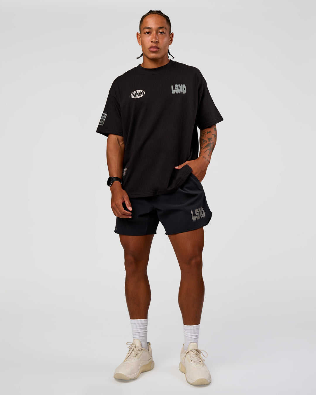 Man wearing Static Grit Heavyweight Oversized Tee - Black-Alloy | Model:Malebo | Size:M - view 10