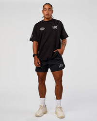 Man wearing Static Grit Heavyweight Oversized Tee - Black-Alloy | Model:Malebo | Size:M | Thumbnail Index: 9