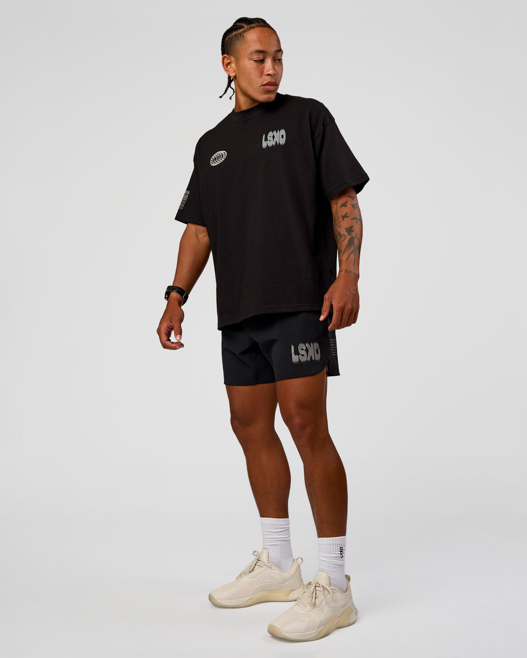 Man wearing Static Grit Heavyweight Oversized Tee - Black-Alloy | Model:Malebo | Size:M - view 6