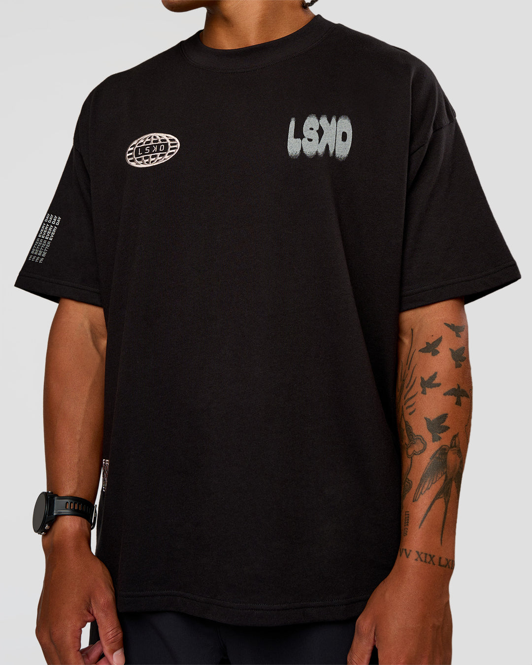 Man wearing Static Grit Heavyweight Oversized Tee - Black-Alloy | Model:Malebo | Size:M - view 11