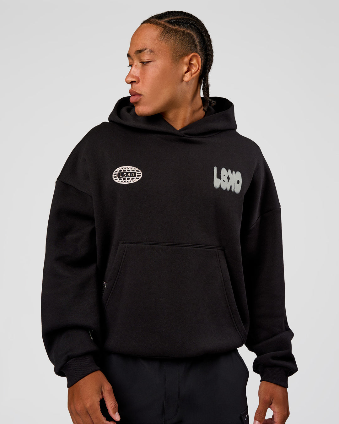 Man wearing Static Grit Unisex Boxy Hoodie - Black-Alloy | Model:Malebo | Size:M - view 7