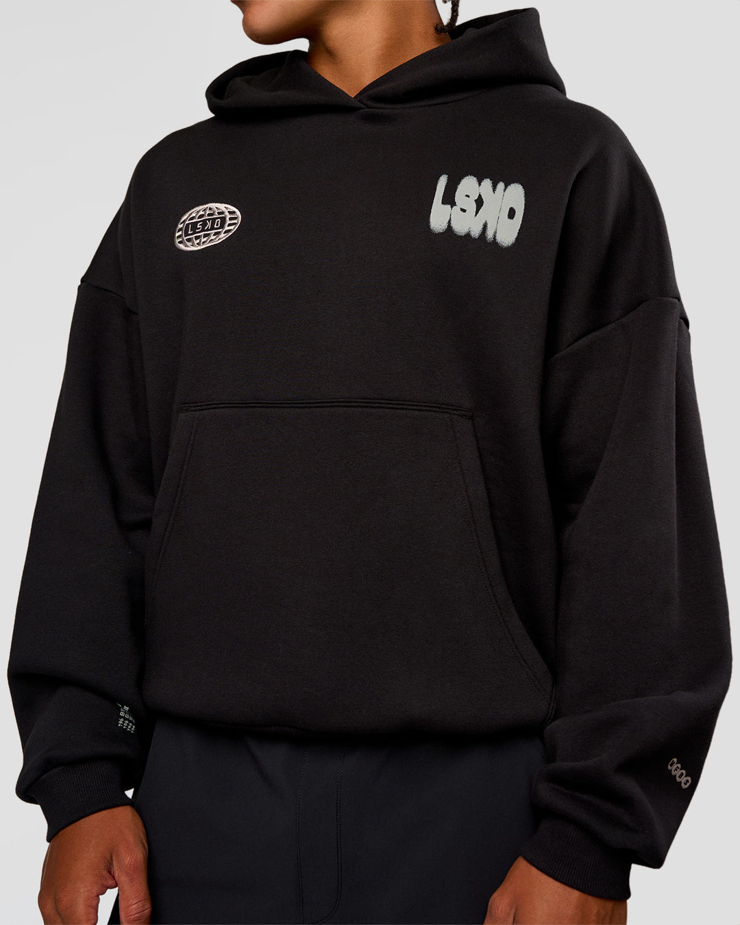 Man wearing Static Grit Unisex Boxy Hoodie - Black-Alloy | Model:Malebo | Size:M - view 14