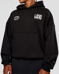 Man wearing Static Grit Unisex Boxy Hoodie - Black-Alloy | Model:Malebo | Size:M | Thumbnail Index: 13