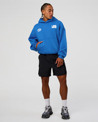 Man wearing Static Grit Unisex Boxy Hoodie - Palace Blue-White | Model:Malebo | Size:M | Thumbnail Index: 7