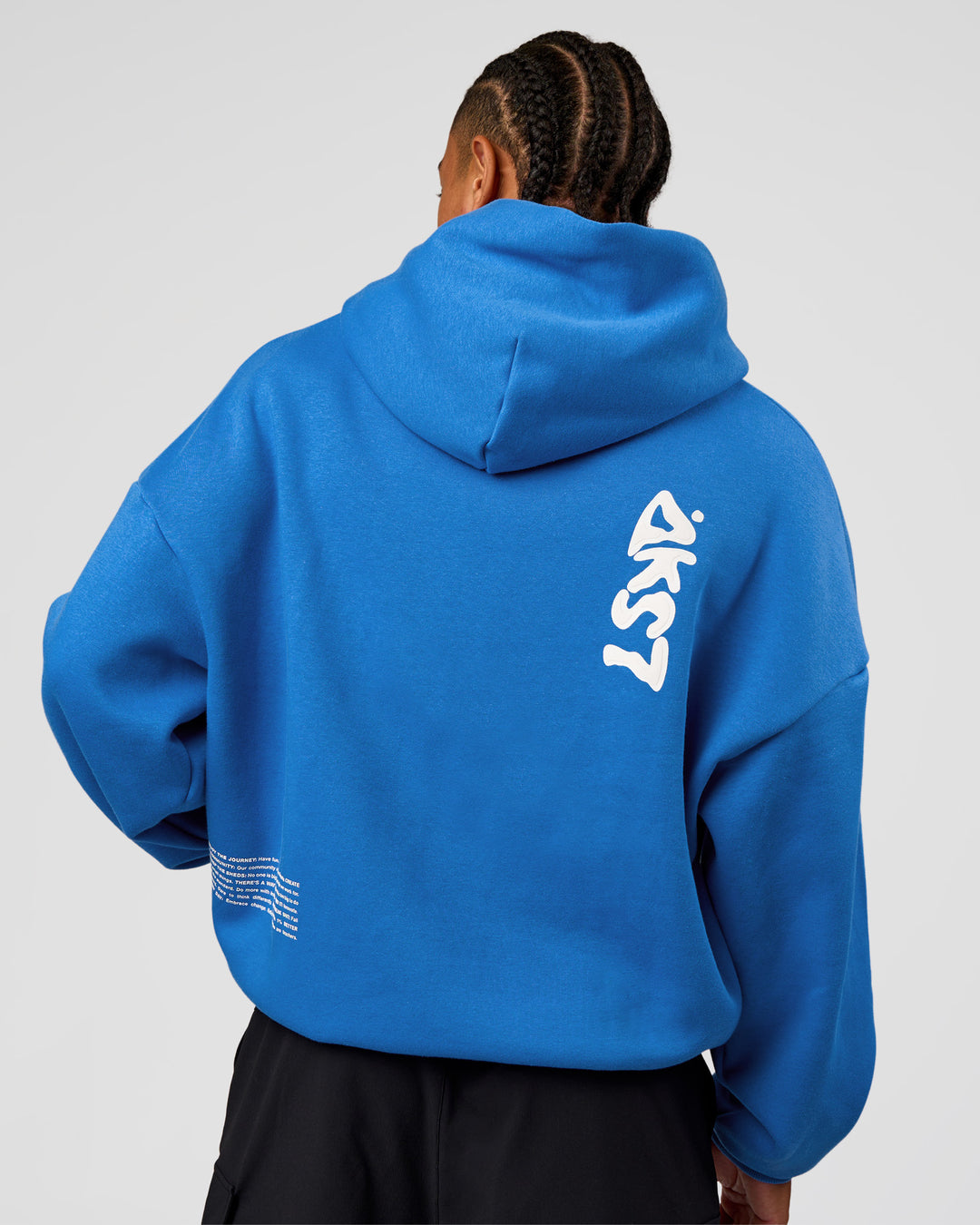 Man wearing Static Grit Unisex Boxy Hoodie - Palace Blue-White | Model:Malebo | Size:M - view 4