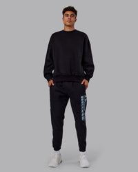 Man wearing Static Track Pant - Black-Skyride | Model:Jaxon | Size:M | Thumbnail Index: 6