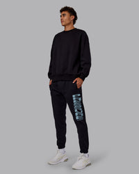 Man wearing Static Track Pant - Black-Skyride | Model:Jaxon | Size:M | Thumbnail Index: 7