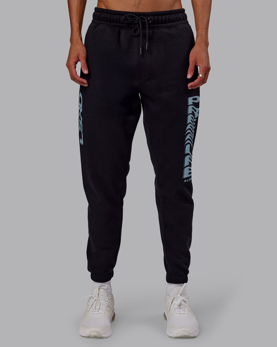 Man wearing Static Track Pant - Black-Skyride | Model:Jaxon | Size:M - view 1