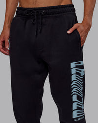 Man wearing Static Track Pant - Black-Skyride | Model:Jaxon | Size:M | Thumbnail Index: 9