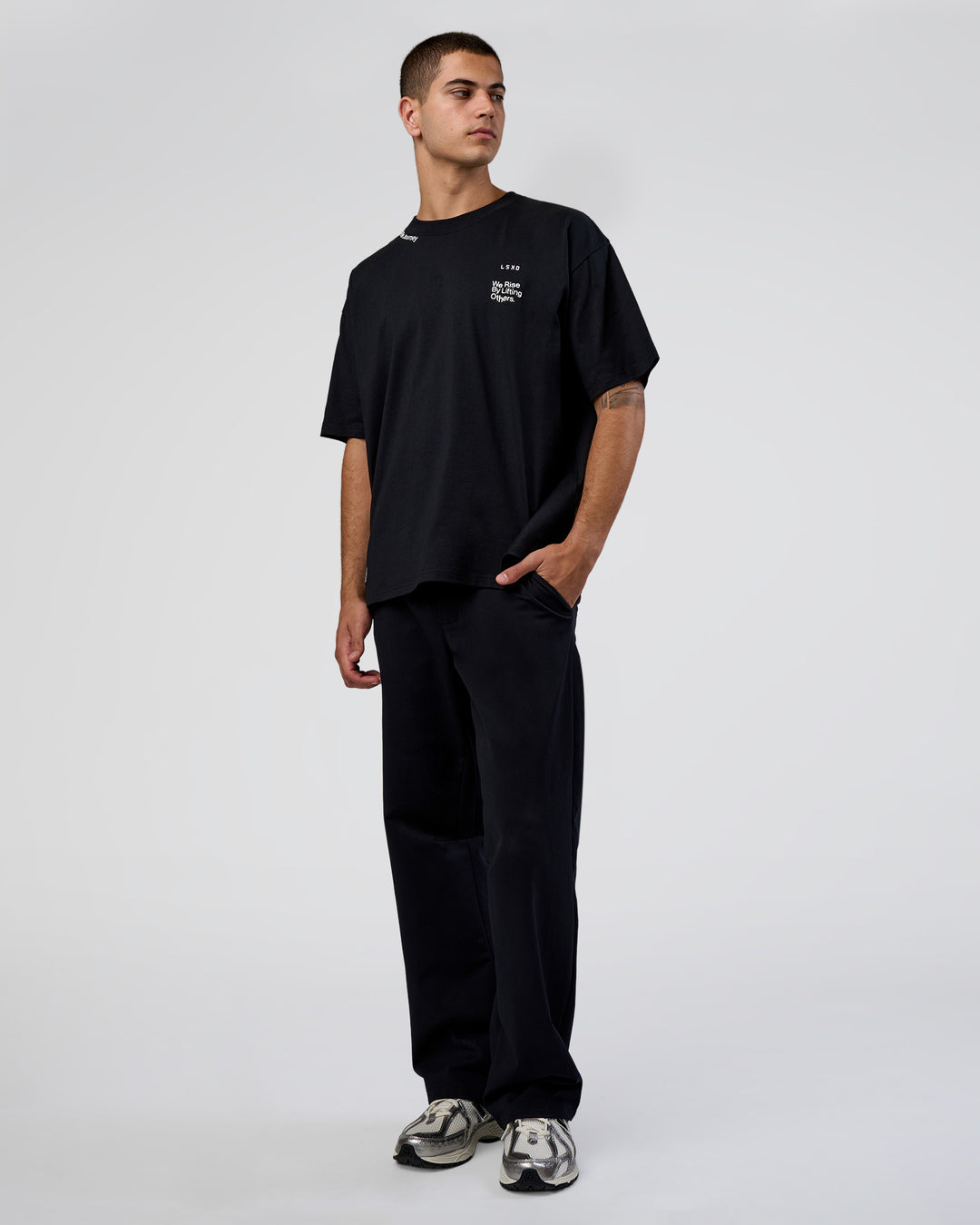 Man wearing Sticker Heavyweight Oversized Tee - Black-White | Model:Zoran | Size:M - view 6