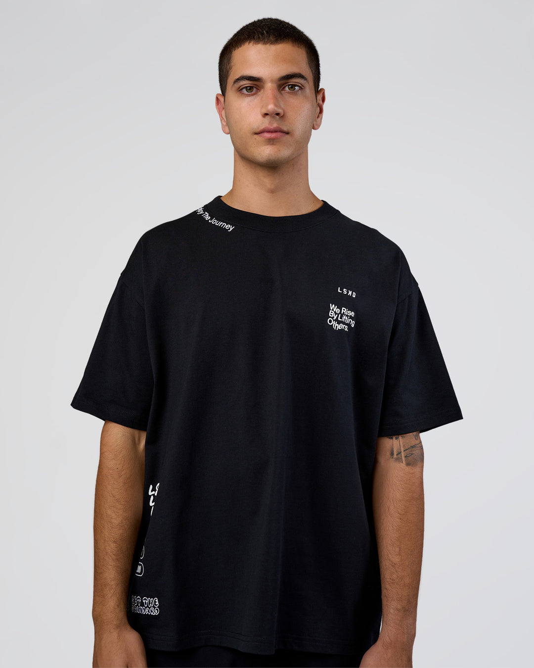 Man wearing Sticker Heavyweight Oversized Tee - Black-White | Model:Zoran | Size:M - view 2