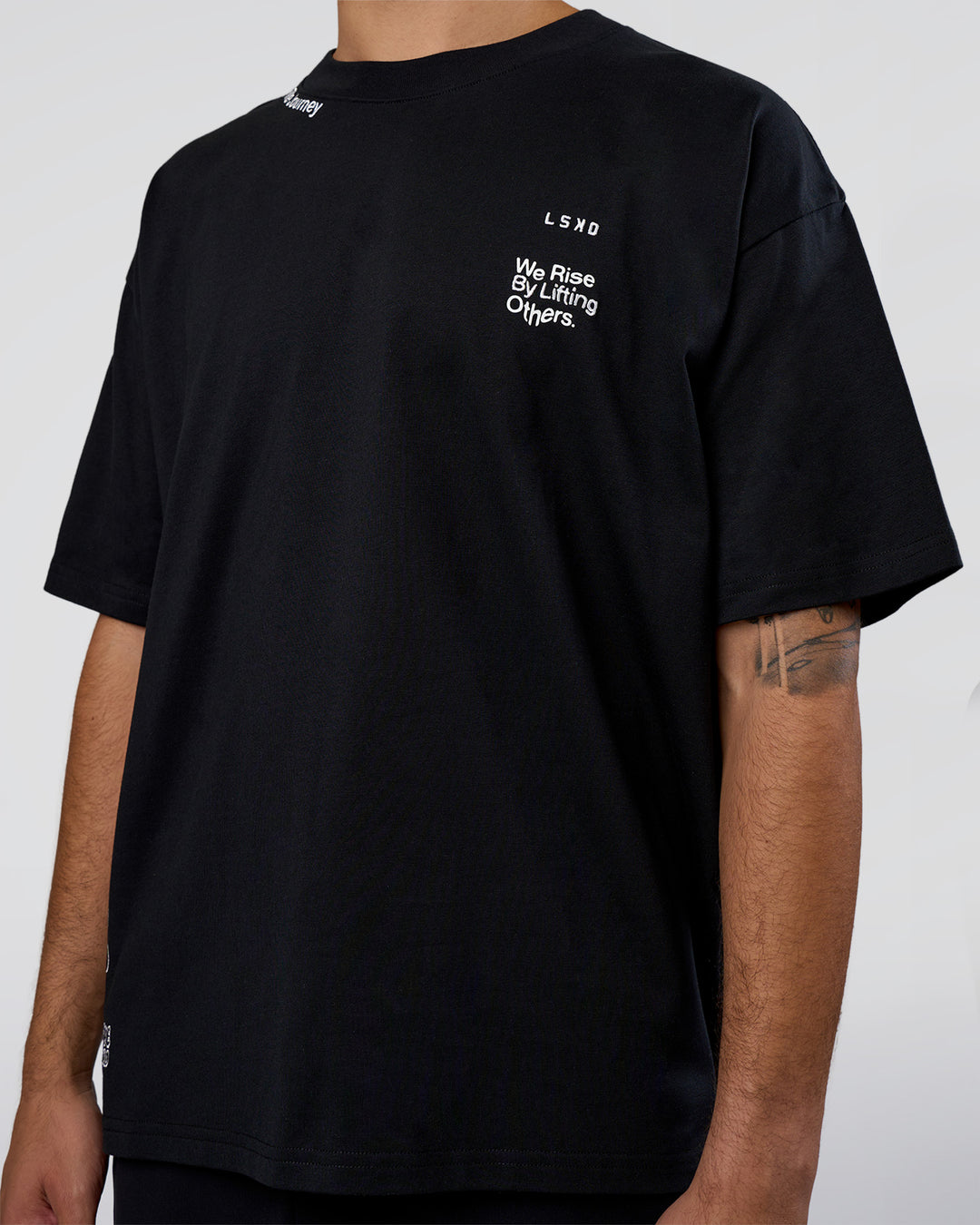 Man wearing Sticker Heavyweight Oversized Tee - Black-White | Model:Zoran | Size:M - view 9