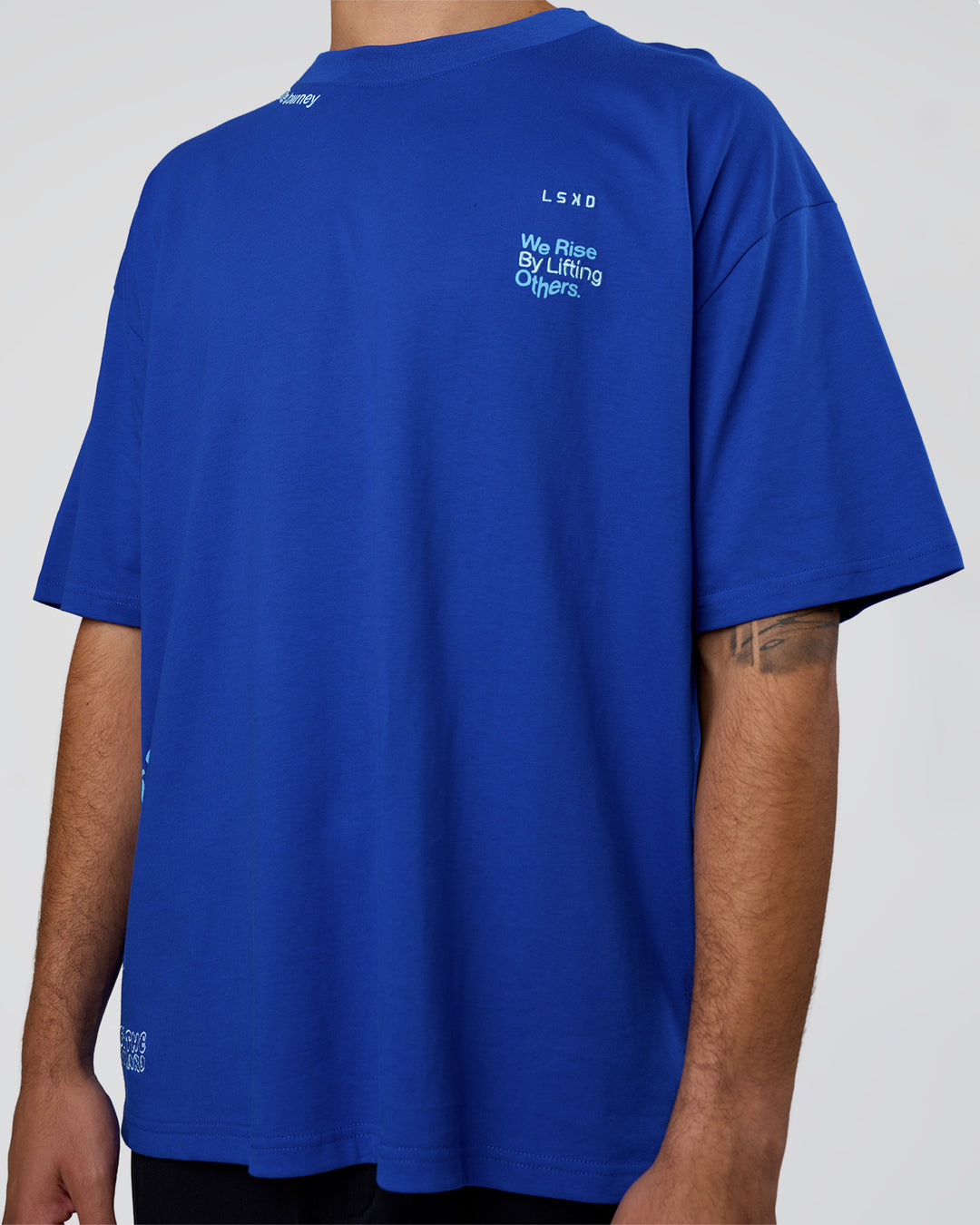 Man wearing Sticker Heavyweight Oversized Tee - Electric Indigo-Baltic Sea | Model:Zoran | Size:M - view 10