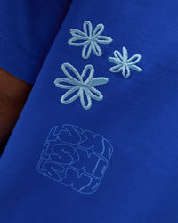 Man wearing Sticker Heavyweight Oversized Tee - Electric Indigo-Baltic Sea | Model:Zoran | Size:M | Thumbnail Index: 10