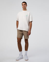 Man wearing Sticker Heavyweight Oversized Tee - Off White-Jelly Mint | Model:Zoran | Size:M | Thumbnail Index: 6