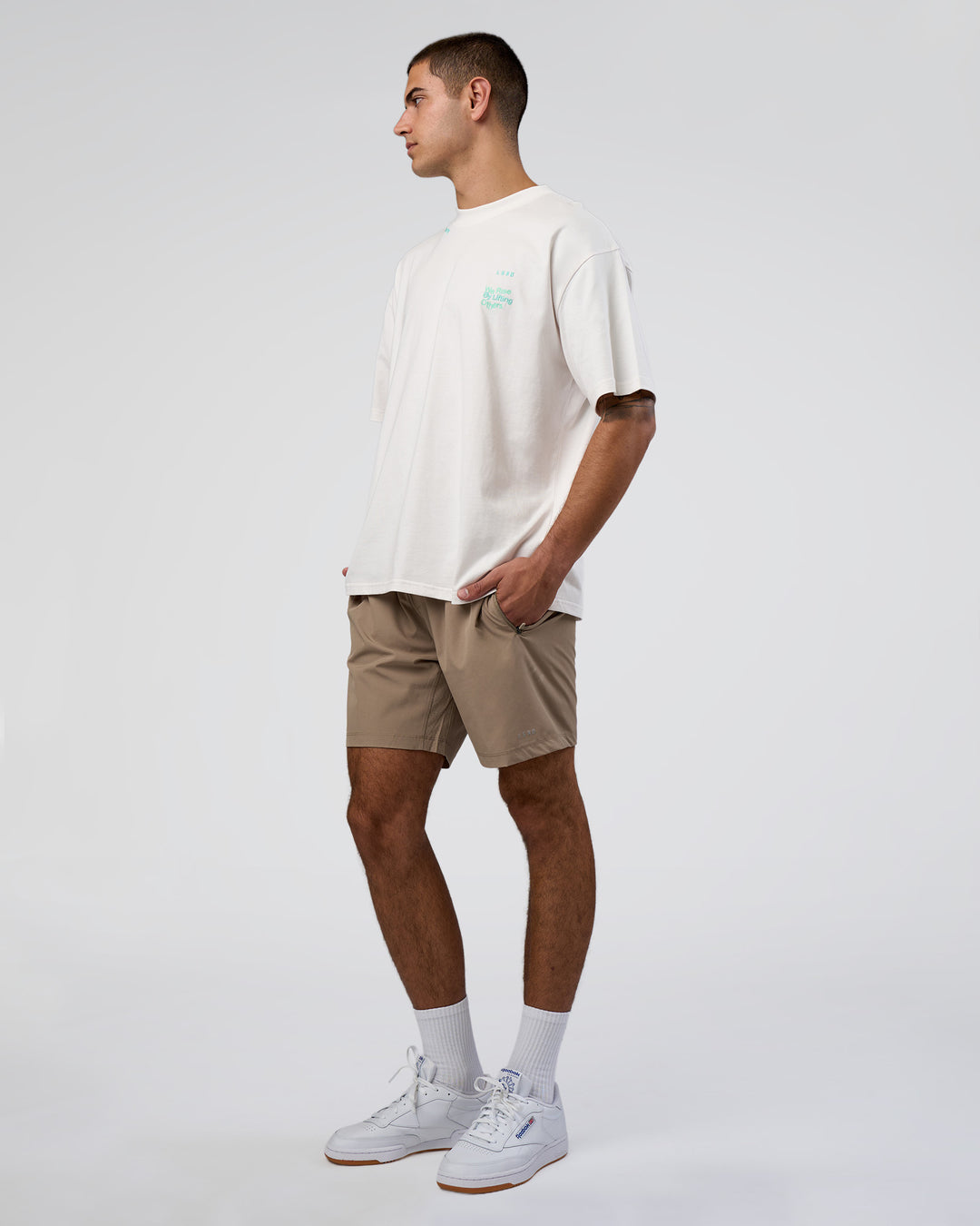 Man wearing Sticker Heavyweight Oversized Tee - Off White-Jelly Mint | Model:Zoran | Size:M - view 6