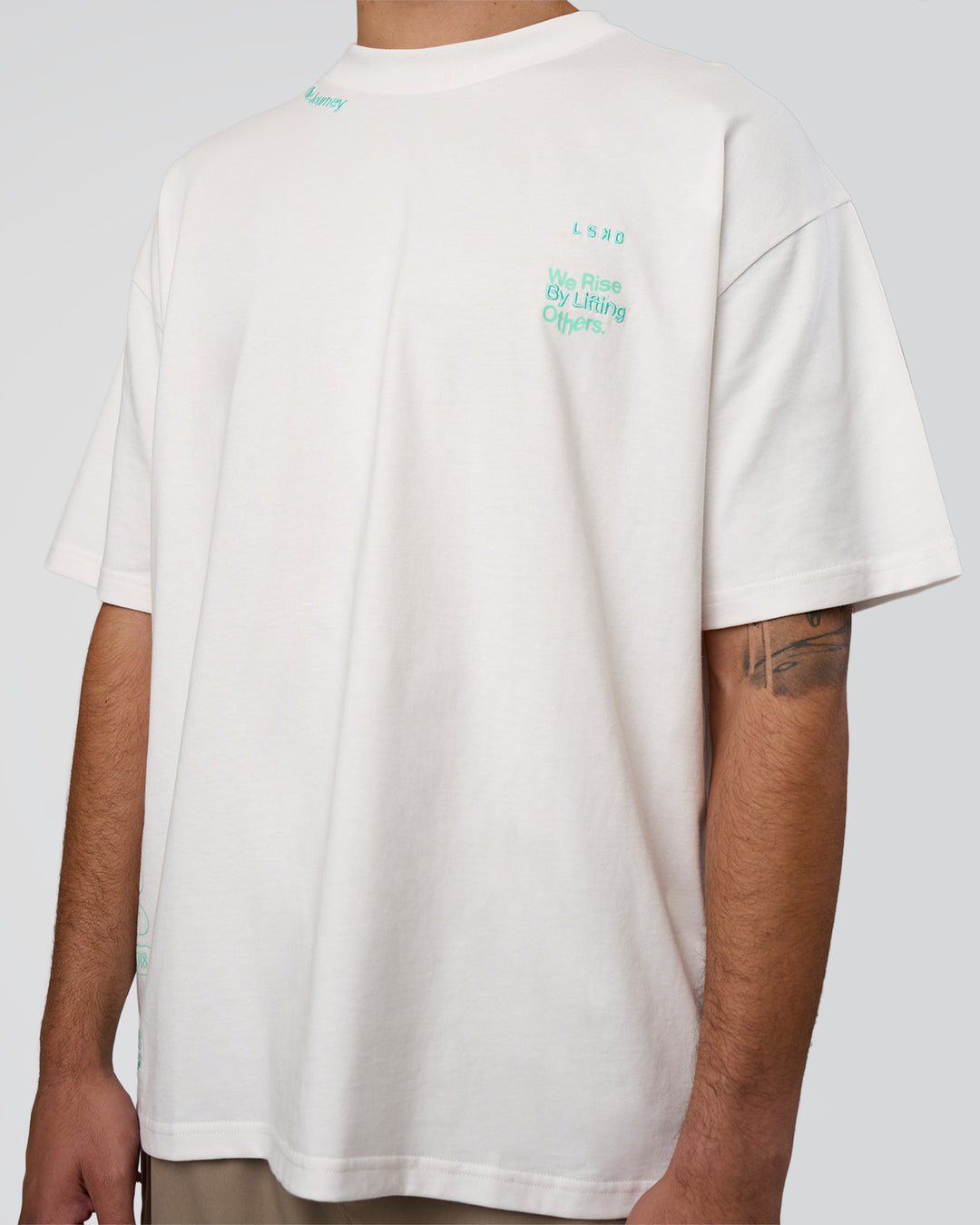Man wearing Sticker Heavyweight Oversized Tee - Off White-Jelly Mint | Model:Zoran | Size:M - view 8