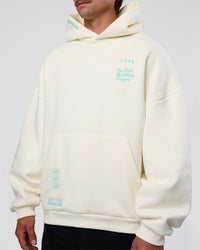 Man wearing Sticker Unisex Oversized Hoodie - Off White-Jelly Mint | Model:Konnor | Size:M | Thumbnail Index: 14