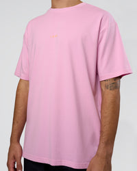 Man wearing Together We Rise FLXCotton Oversized Tee - Bubblegum-Warm Apricot | Model:Zoran | Size:L | Thumbnail Index: 6