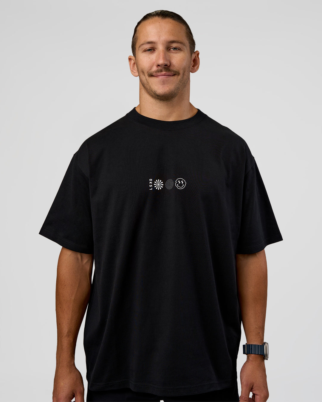 Man wearing Trust The Process Heavyweight Unisex Oversized Tee - Black-White | Model:Jaiden | Size:M - view 3