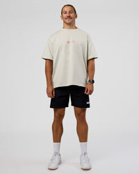 Man wearing Trust The Process Heavyweight Unisex Oversized Tee - Digital Mist-Ultra Pink | Model:Jaiden | Size:M | Thumbnail Index: 7